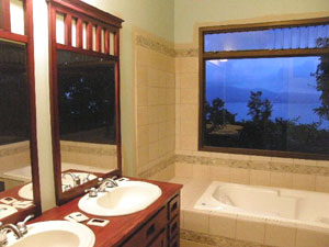 The bathrooms also have beautiful vistas from this secluded location.